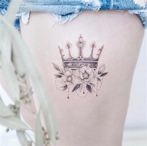 feminine crown tattoos.